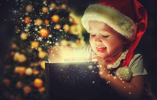 Christmas miracle, magic gift box and child baby girl